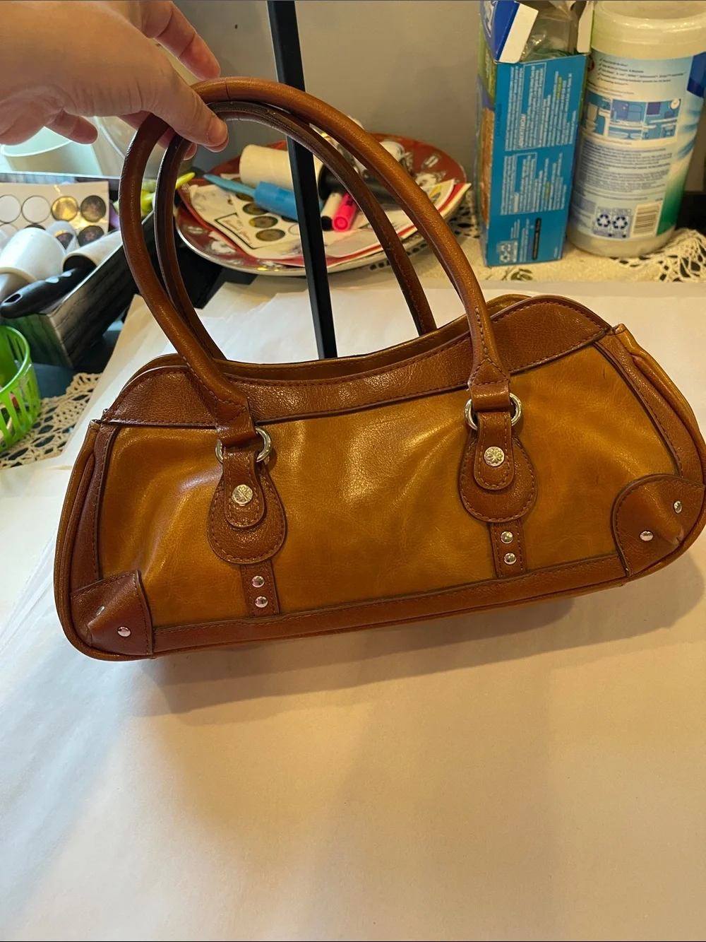 Rina Rich Brown and Tan Leather and vinyl Handbag Label View